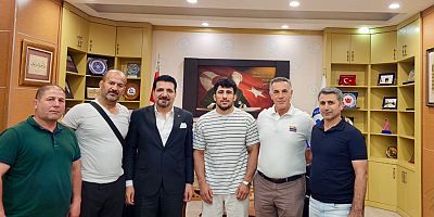 BAŞKAN KOÇ, MİLLİ GÜREŞÇİYİ AĞIRLADI